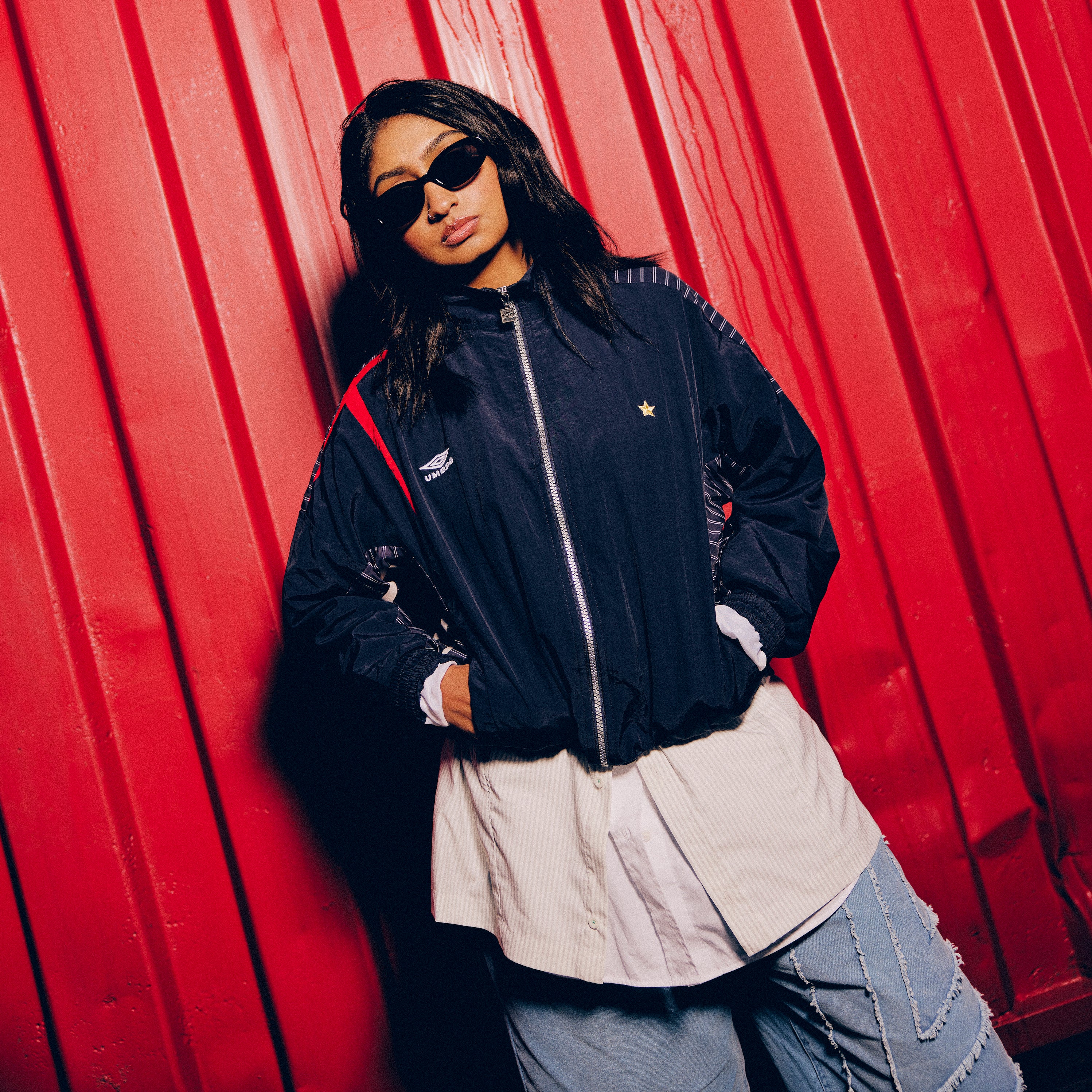 Womens relaxed-fit navy blue track jacket with dropped sleeves - Shop unisex nylon track jackets by Umbro