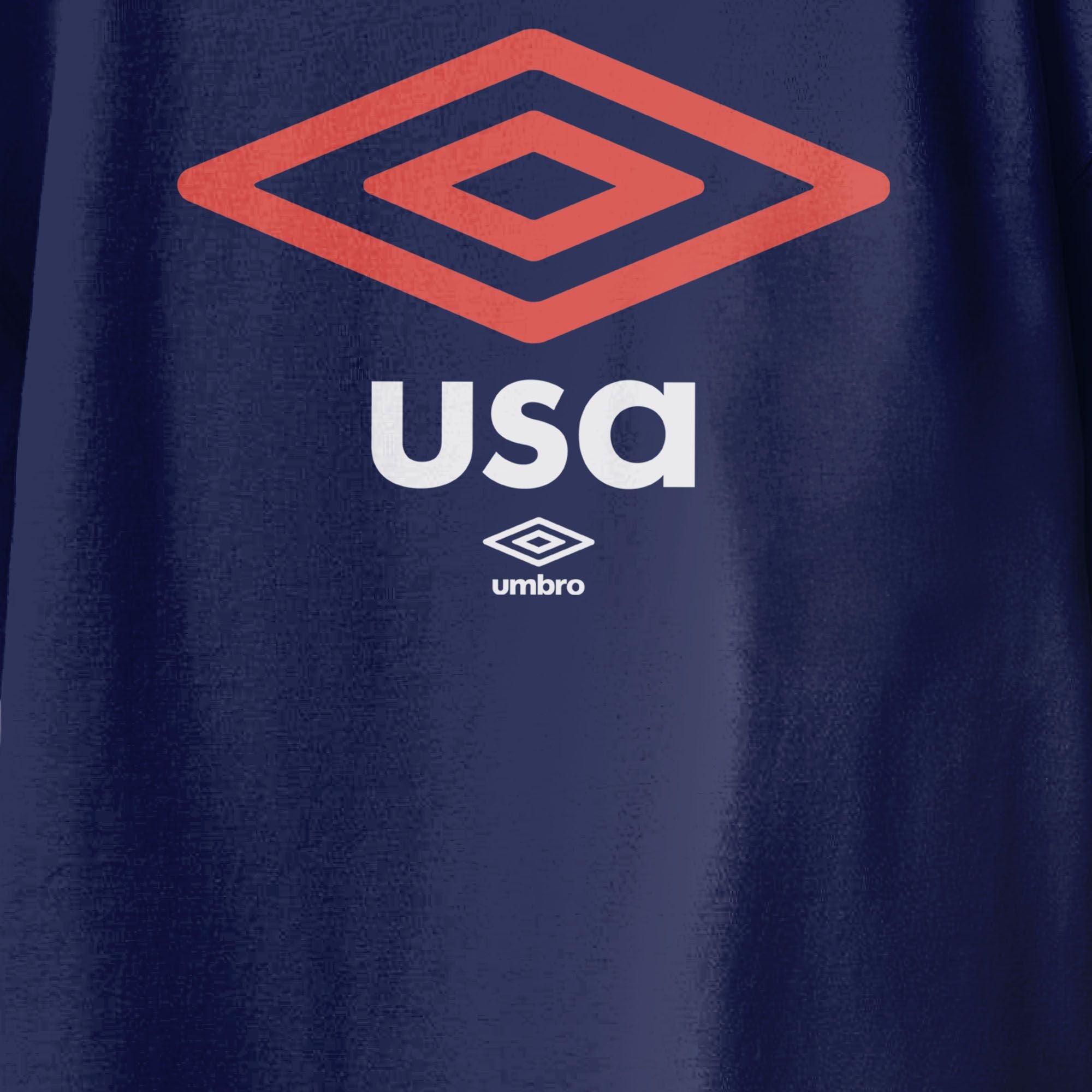 USA diamond logo navy soccer T-shirt. Shop football team tees in soft cotton by Umbro.