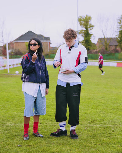 unisex relaxed-fit navy blue track jacket with dropped sleeves with white shirt - Shop unisex nylon track jackets by Umbro