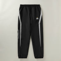 umbro relaxed track pant in black with white details