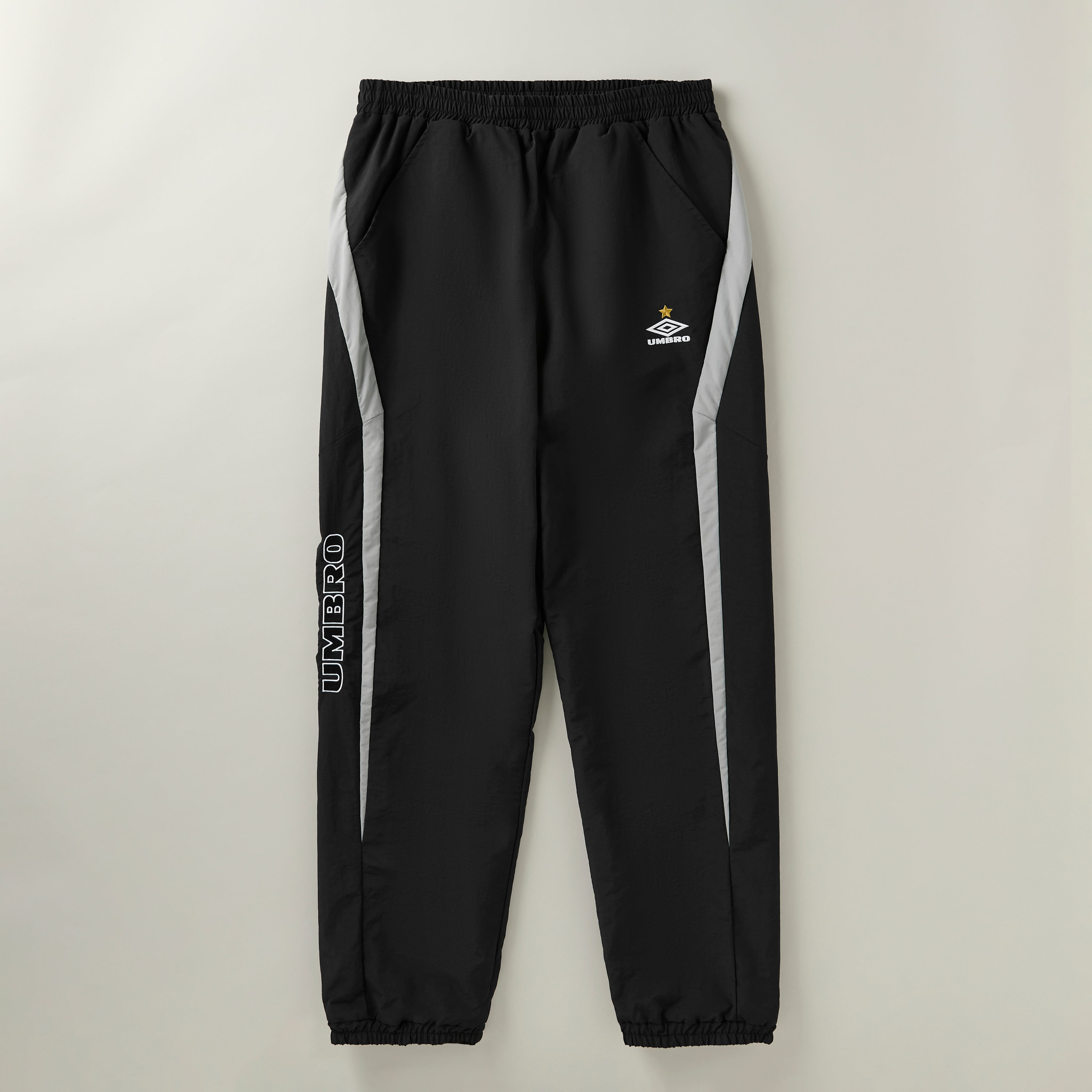 umbro relaxed track pant in black with white details